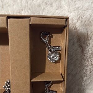 Coach Silver Floral removable charm